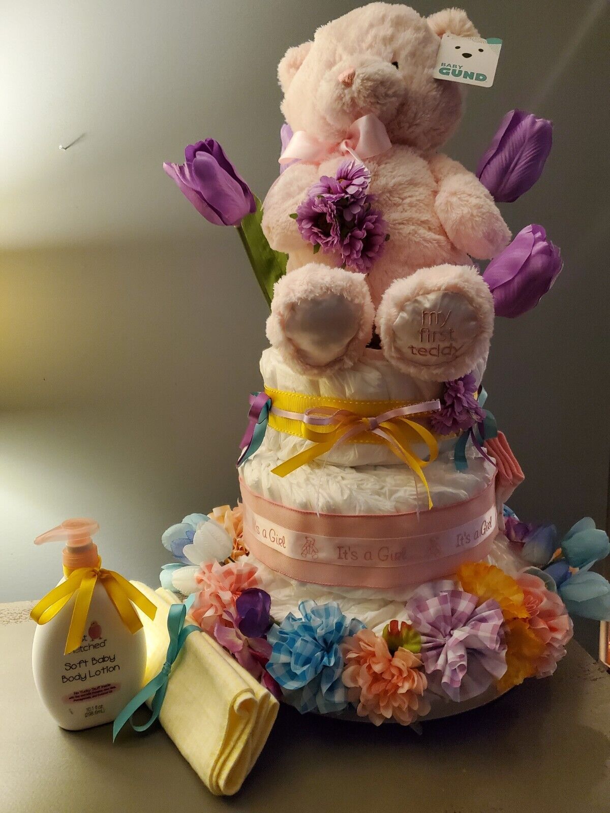 Teddy's Gingham & Floral Girl's, 3-tier Diaper Cake. Very Spring/summer-like.